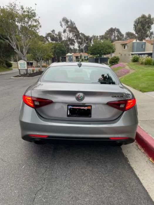 Silver sedan rear after repair